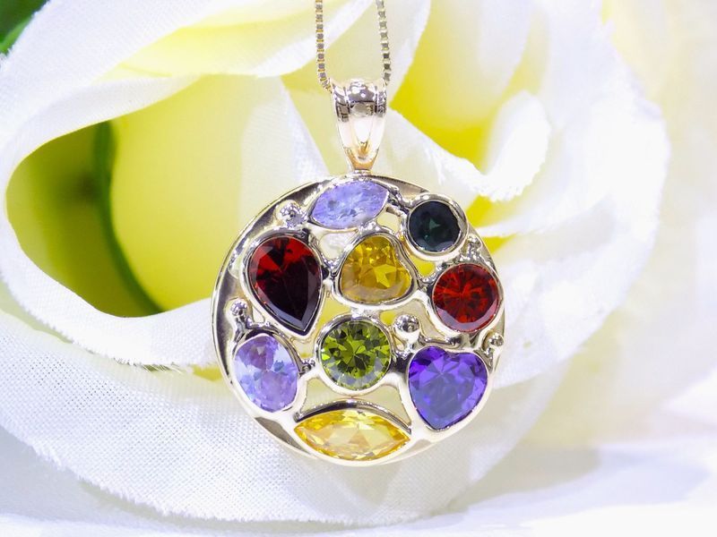 Pendant necklace with various colorful gemstones set