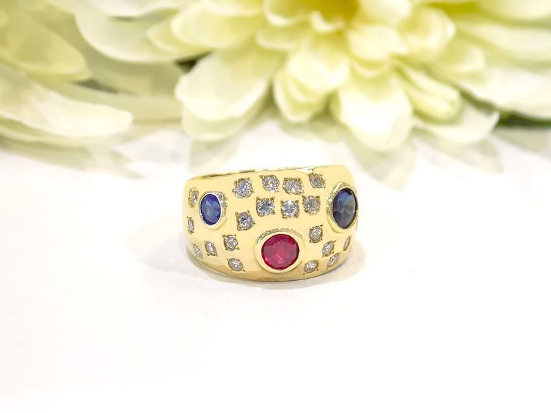 Gold ring with red ruby