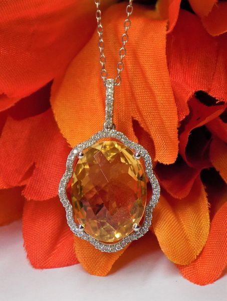 Gold necklace with a large,