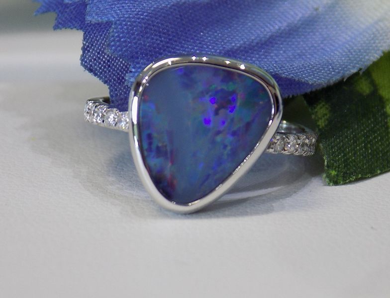 Opal ring with a large blue-green stone