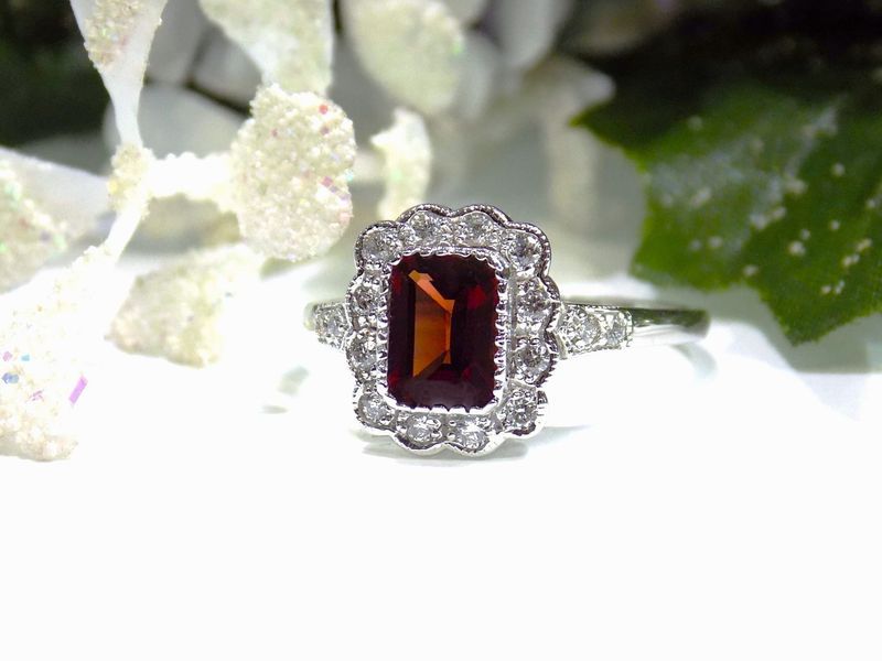 Garnet and diamond ring with a rectangular red stone