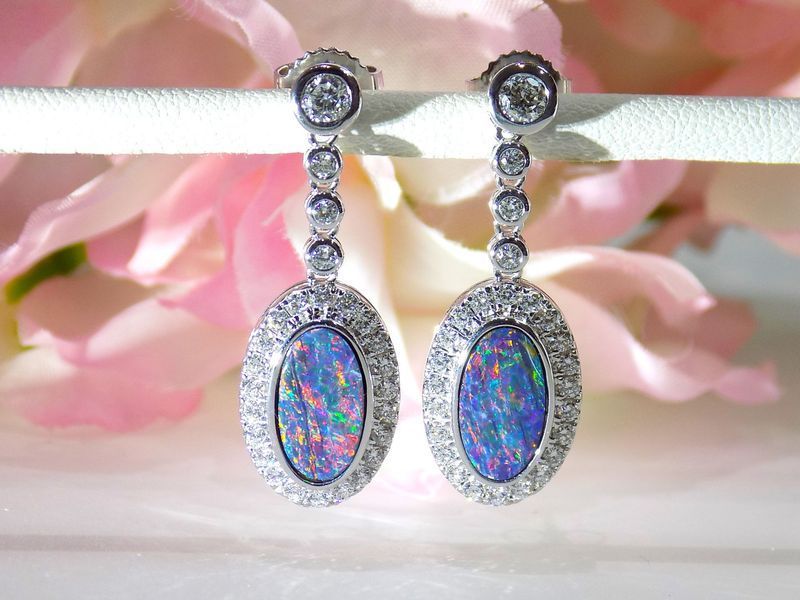 Dangling opal earrings with diamond halo and accents
