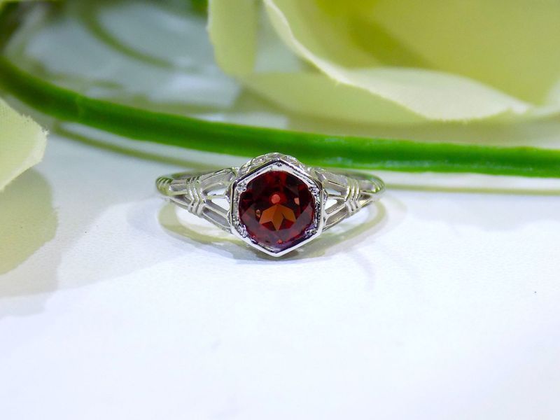 Hexagon-shaped garnet ring with a white gold band