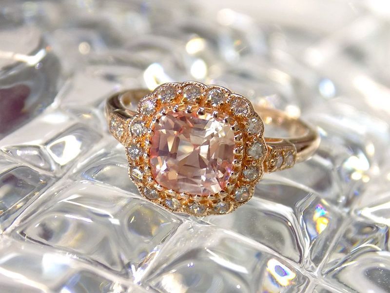 Rose gold ring with peach center stone