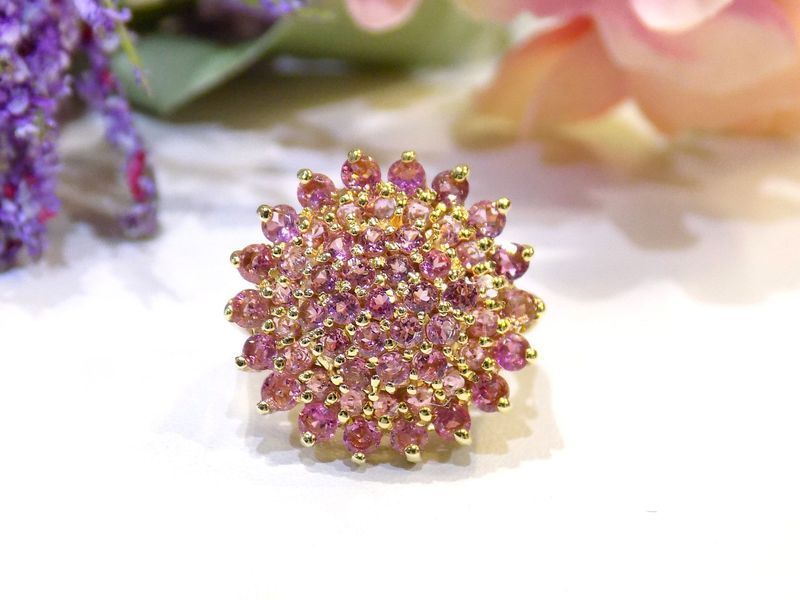 Pink gemstone ring set in gold