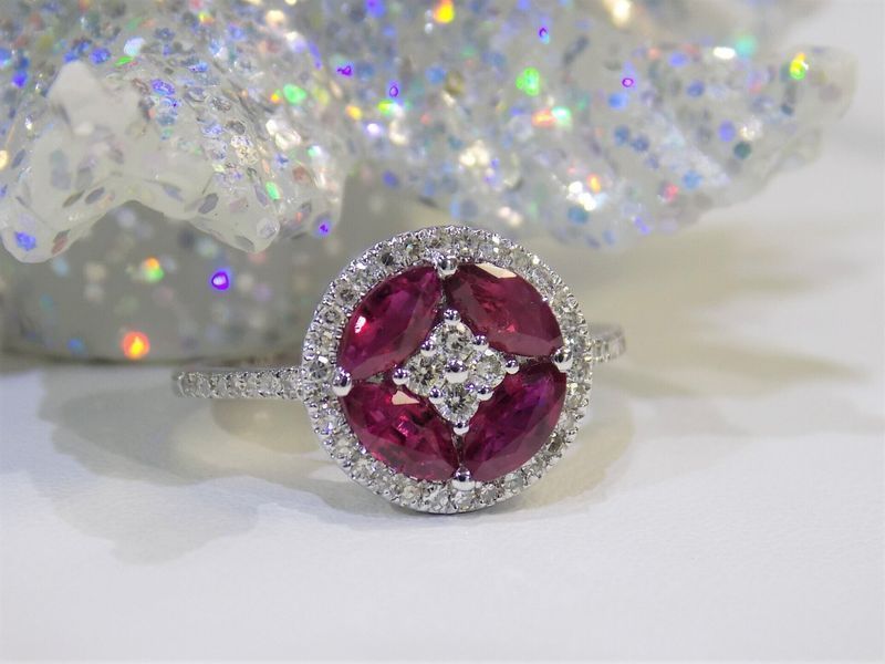 Ruby and diamond ring with a white gold band