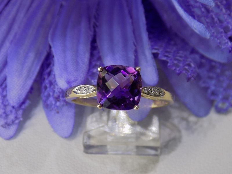 Amethyst ring with small diamonds set in gold