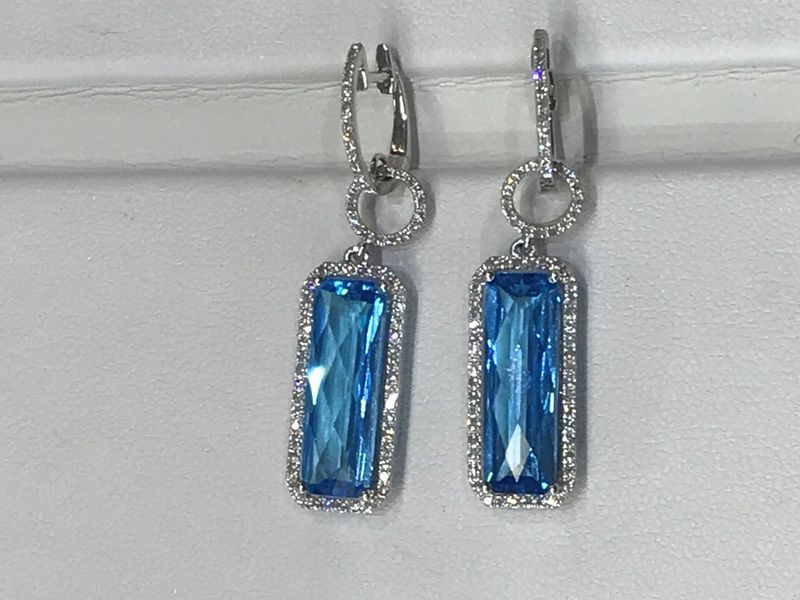 Pair of blue topaz drop earrings with diamond accents