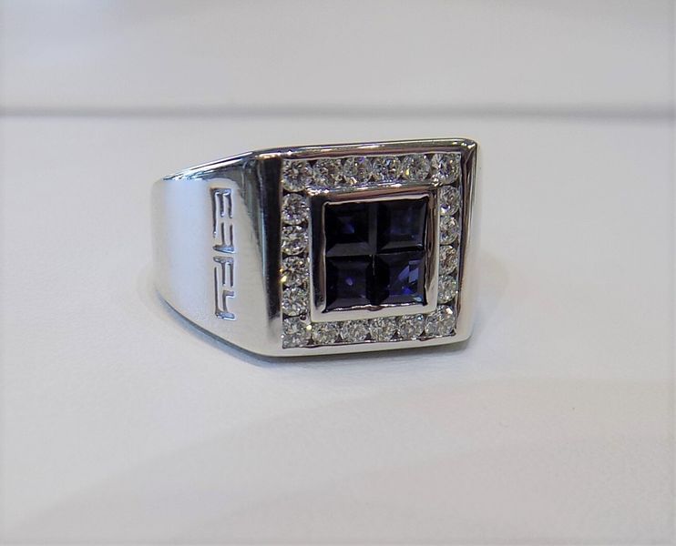 Silver ring with a square face
