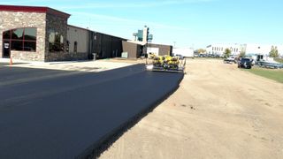Person Covering the Road Pit — Mitchell, SD — Proseal Inc