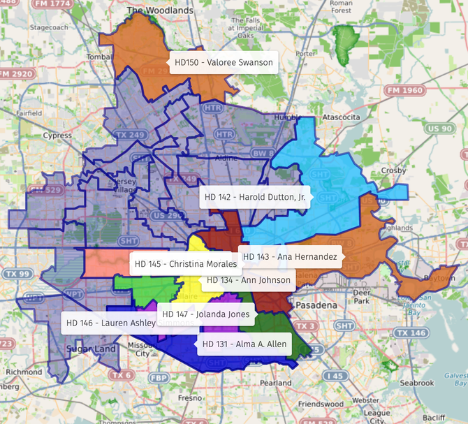 An aerial view of a city with purple and yellow areas