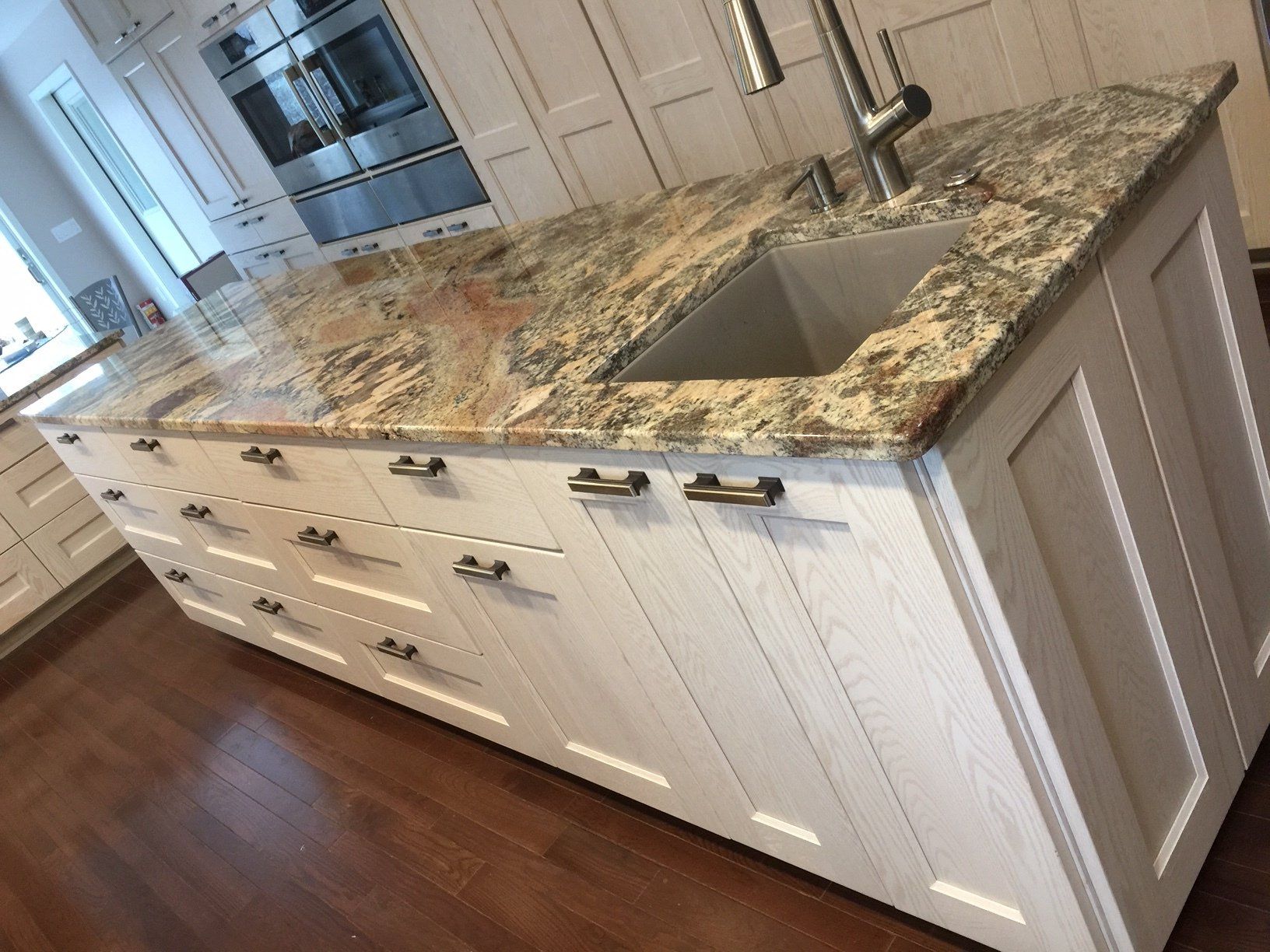 White cabinets on island