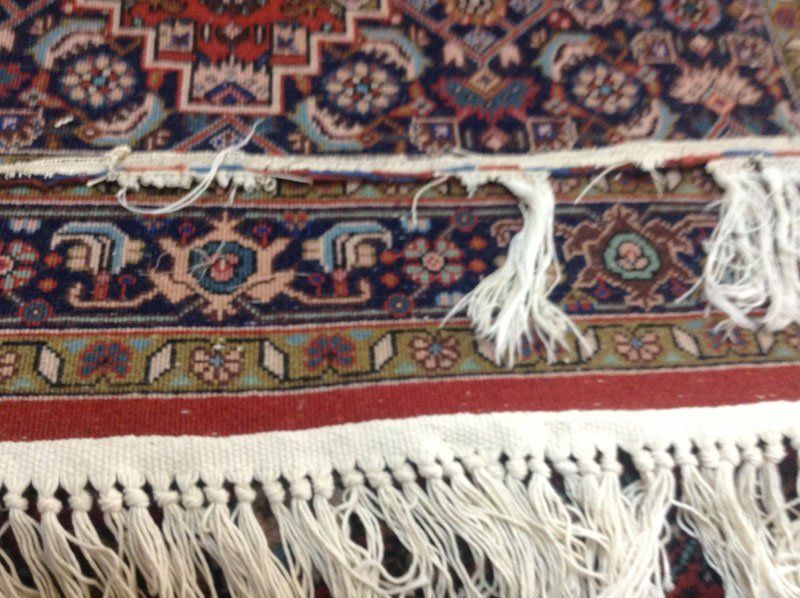 adding new fringe to oriental rug at rug master berkeley