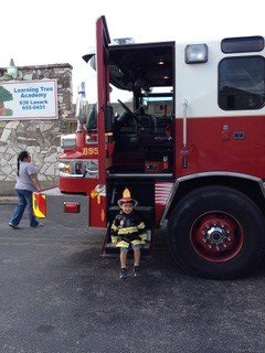Kid at the Fire Truck