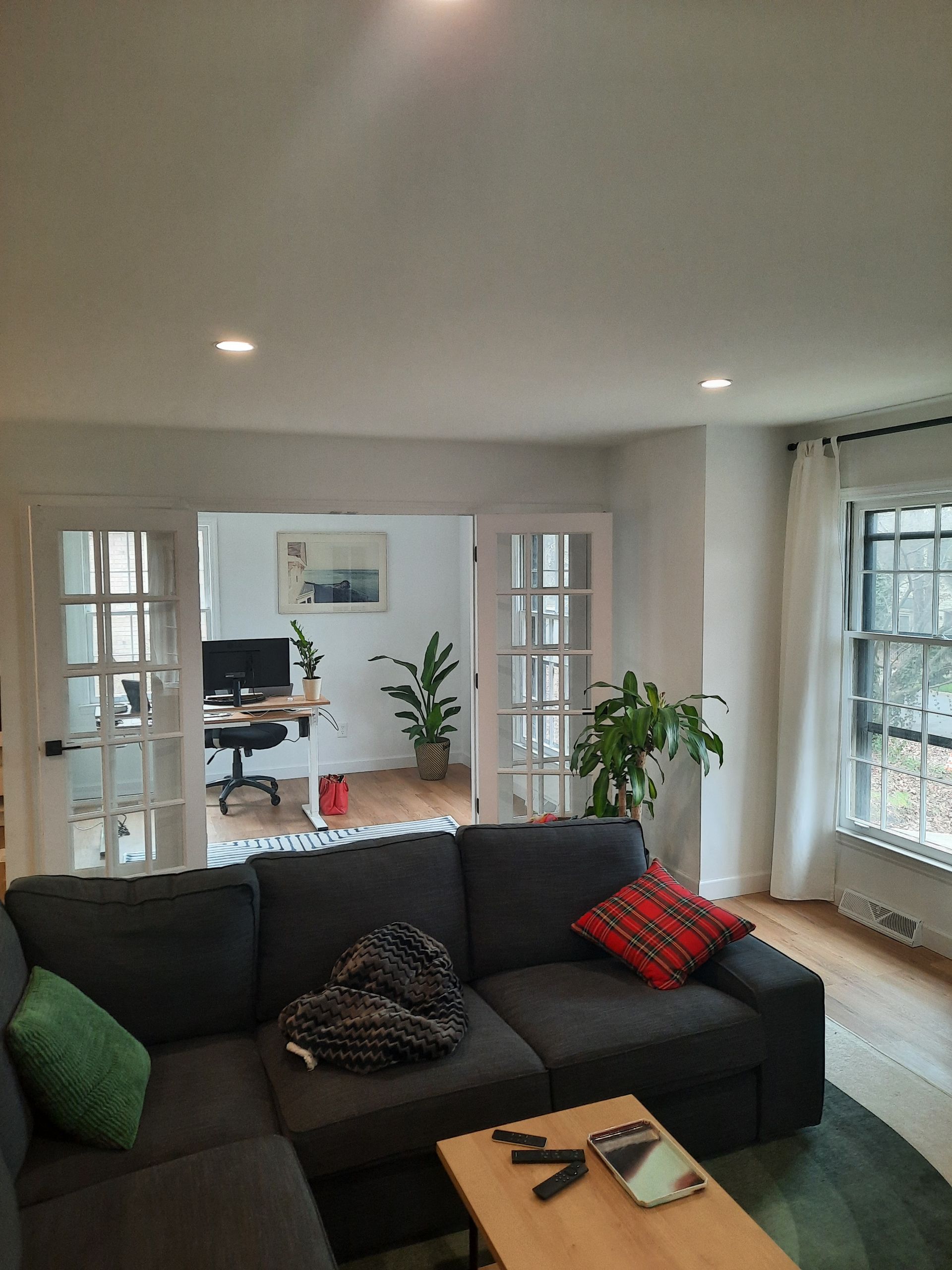 A living room with a couch and a coffee table
