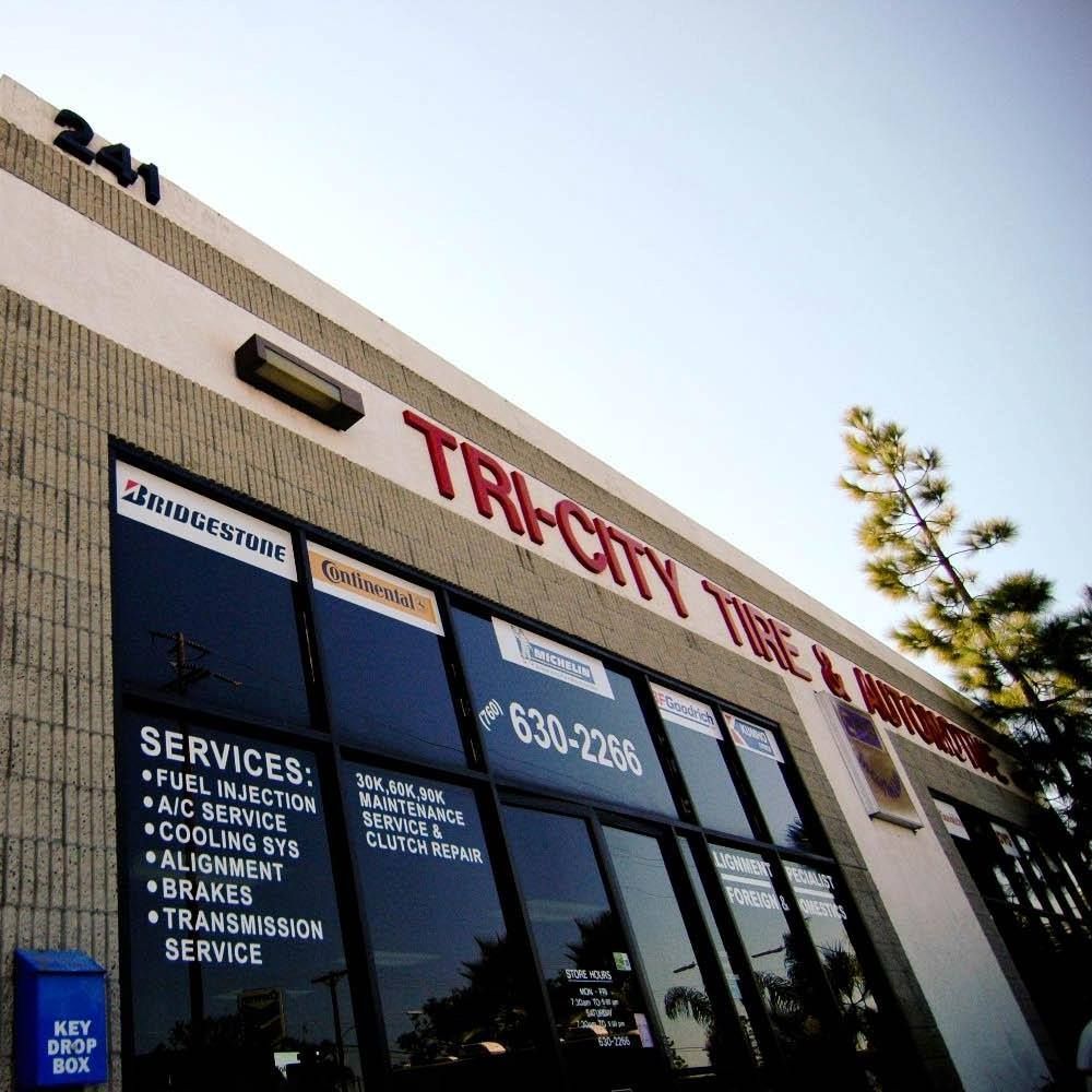 Tri-City Tire & Automotive shop exterior with services listed, phone number, and key drop box.