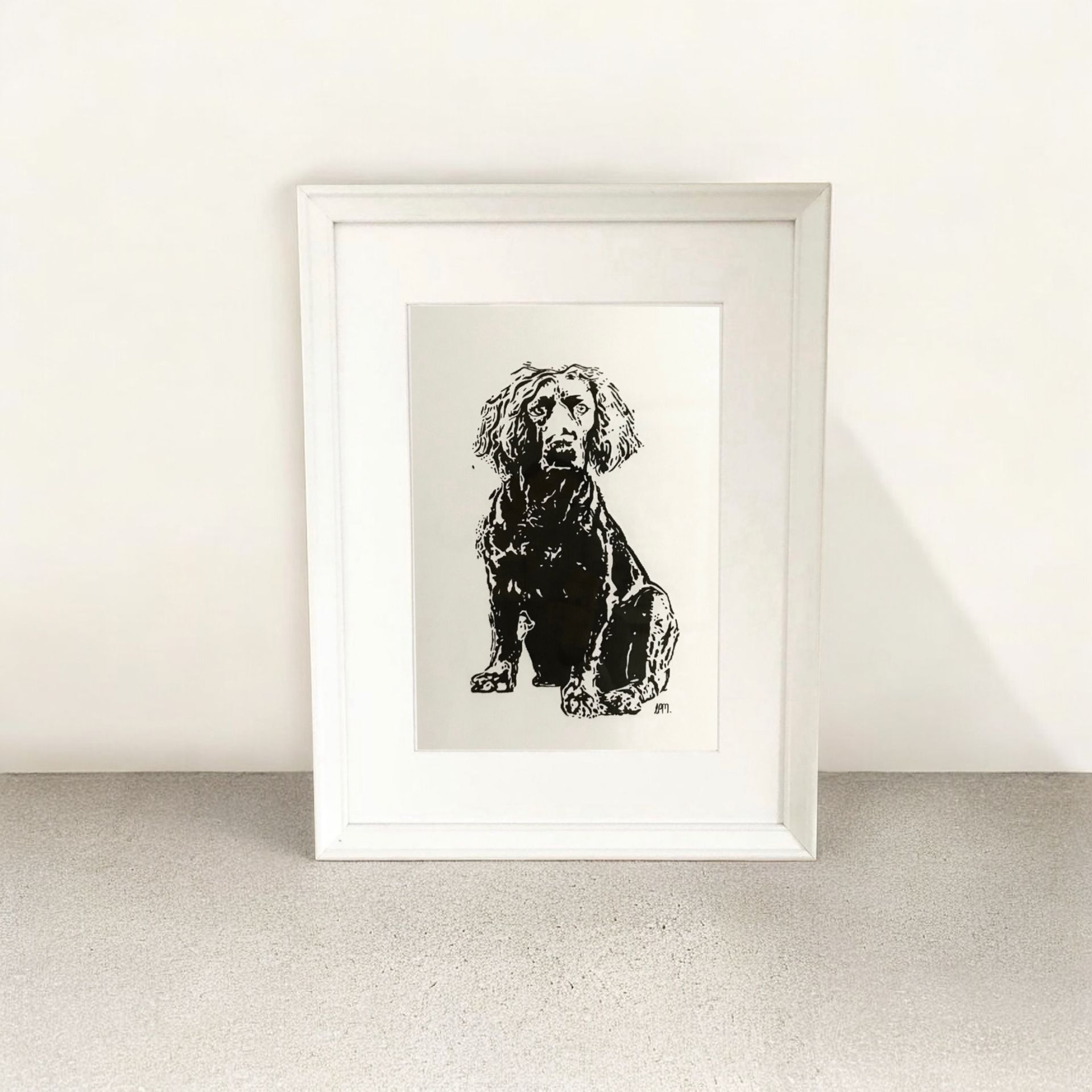 A4 Working Cocker Spaniel sitting in front profile