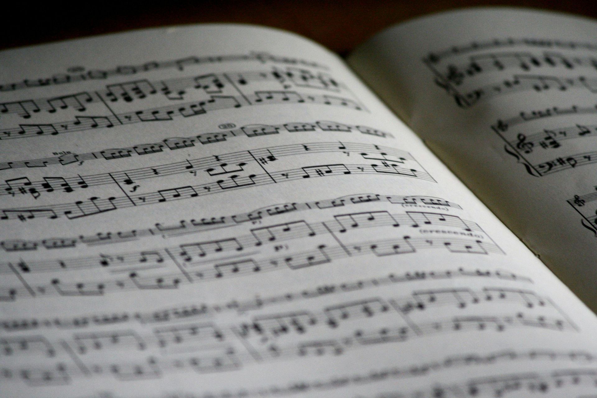 Open book showing musical notation.