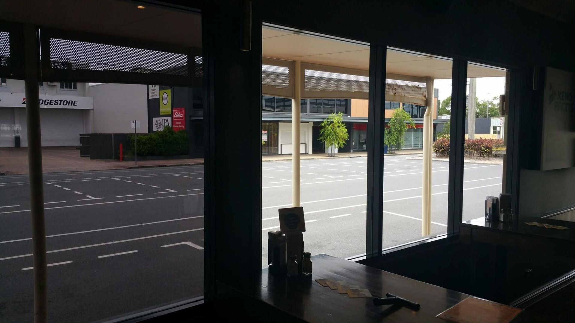 A View of A Street from A Restaurant Window β Epic Window Tinting in Glenella, QLD