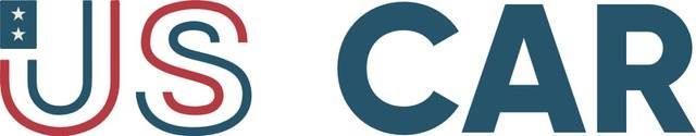 US CAR logo with blue and red text. The letters U and S are stylized like the American flag.