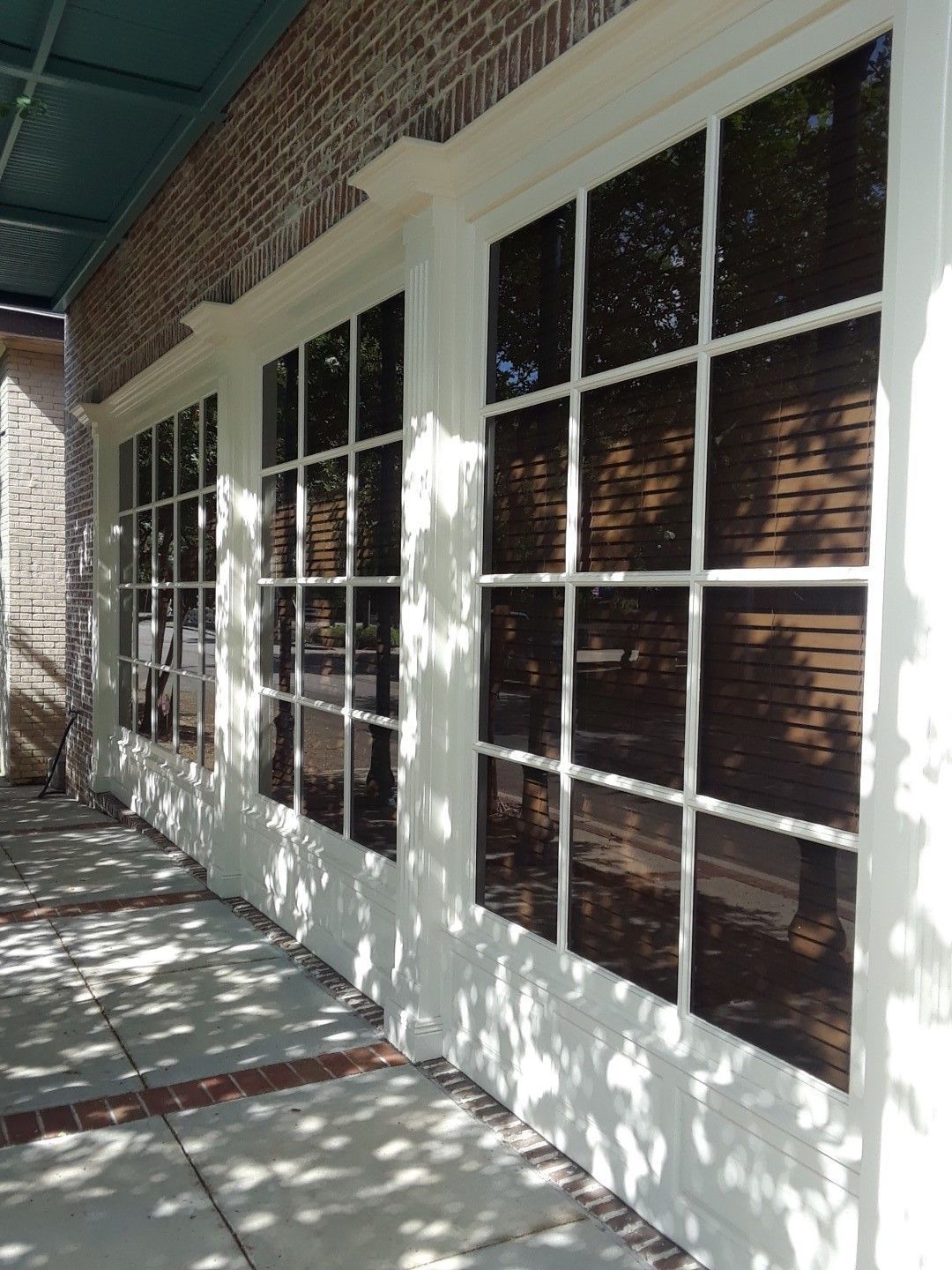 A row of windows on the side of a building