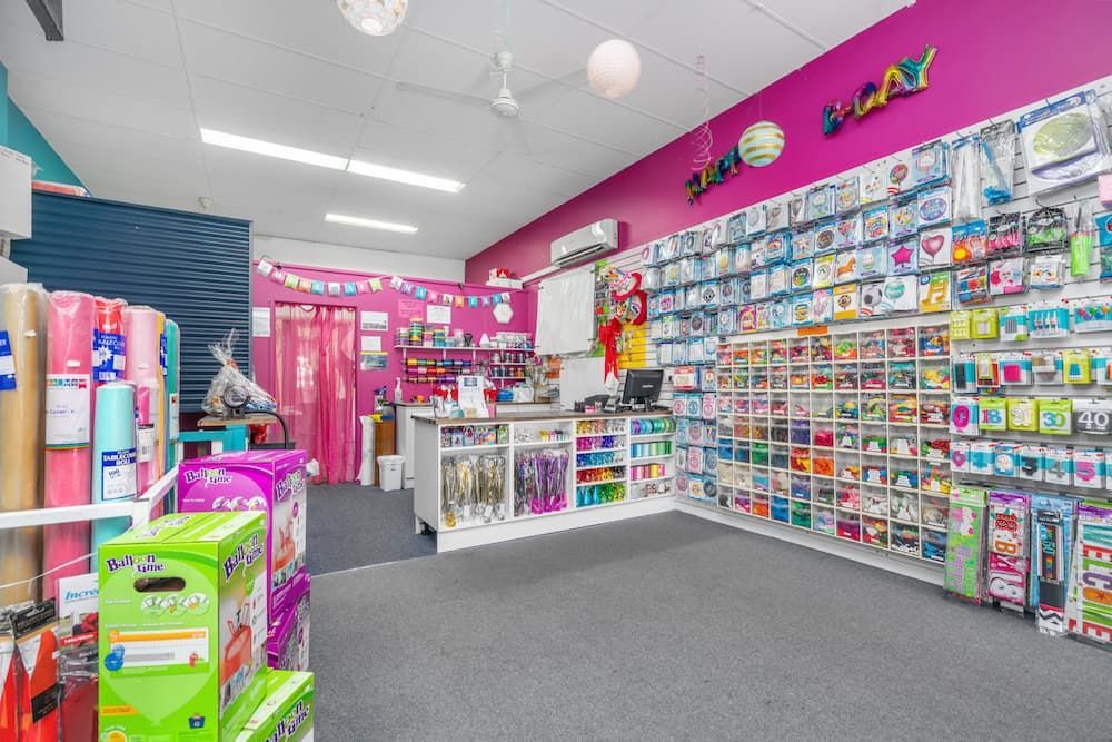 A Store Filled with Lots of Balloons and Greeting Cards — Creative Events Innisfail in Babinda, QLD
