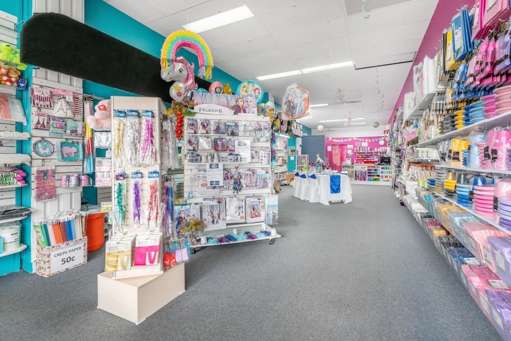 A Large Store Filled with Lots of Balloons and Decorations — Creative Events Innisfail in Babinda, QLD