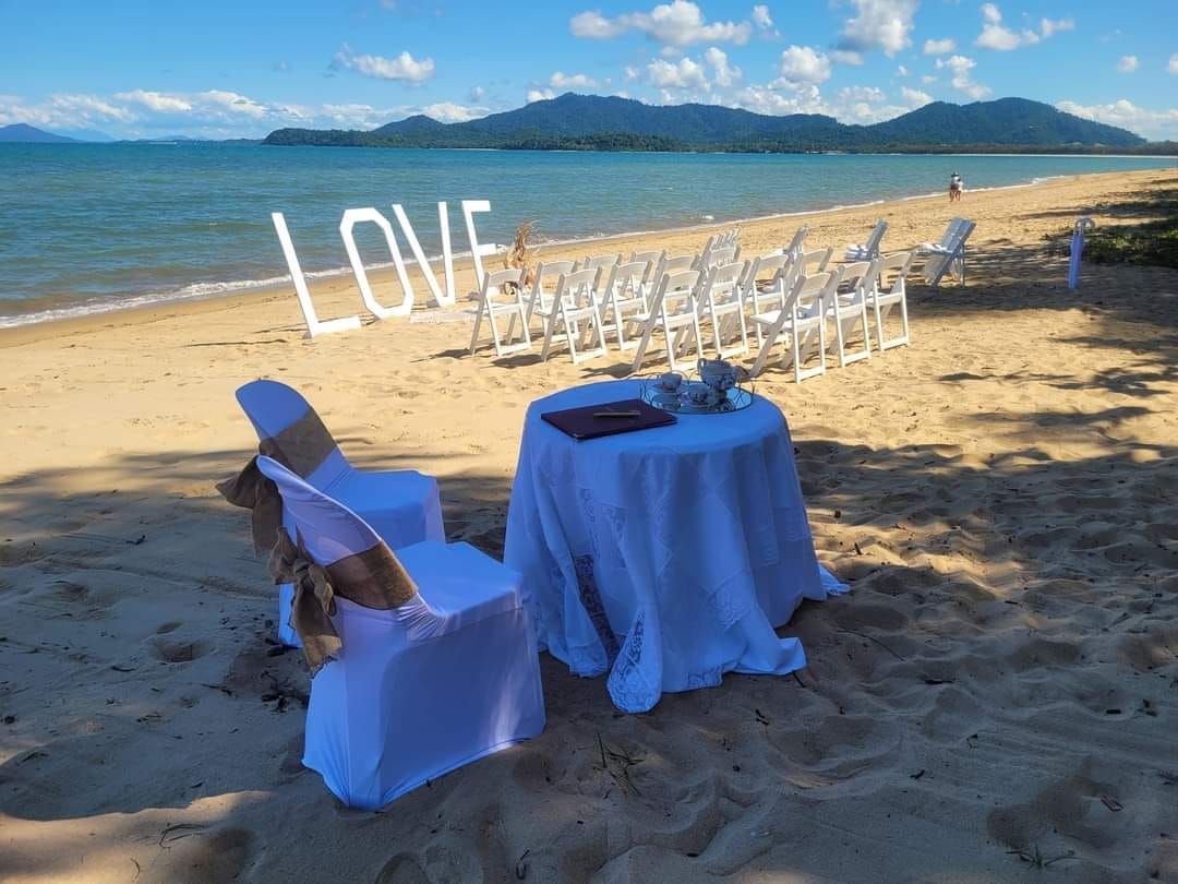A Table and Chairs on The Beach — Creative Events Innisfail in Mission Beach, QLD