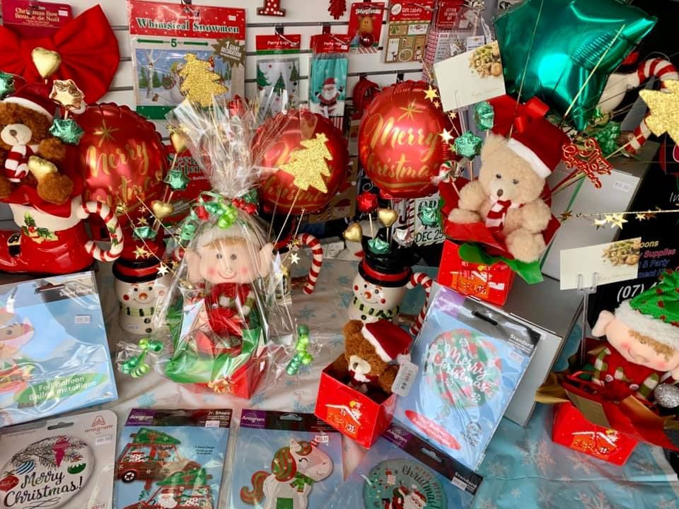 A Bunch of Christmas Decorations Are Sitting on A Table — Creative Events Innisfail in Babinda, QLD