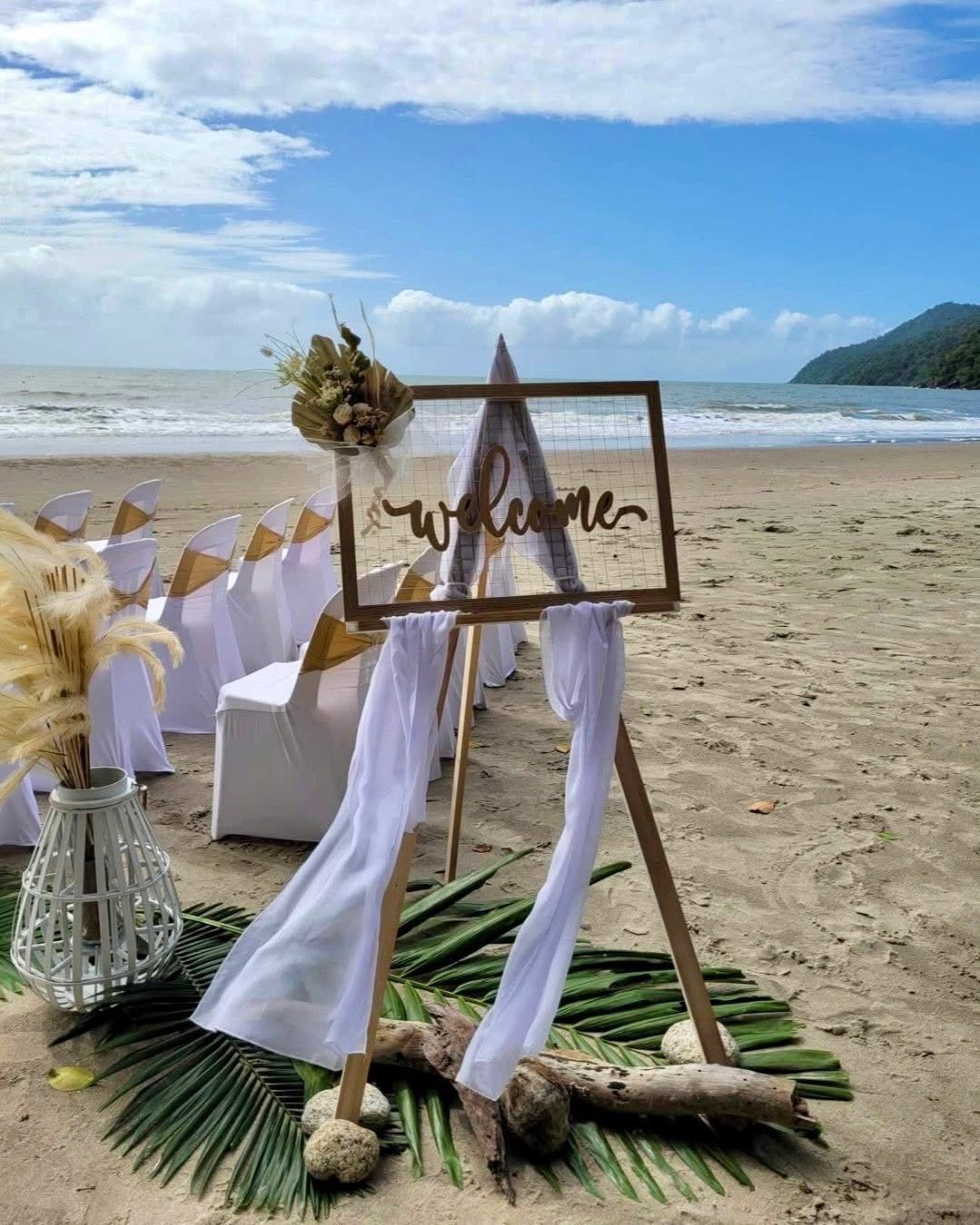 A welcome sign to a wedding on the beach - Creative Events Innisfail in Innisfail, QLD