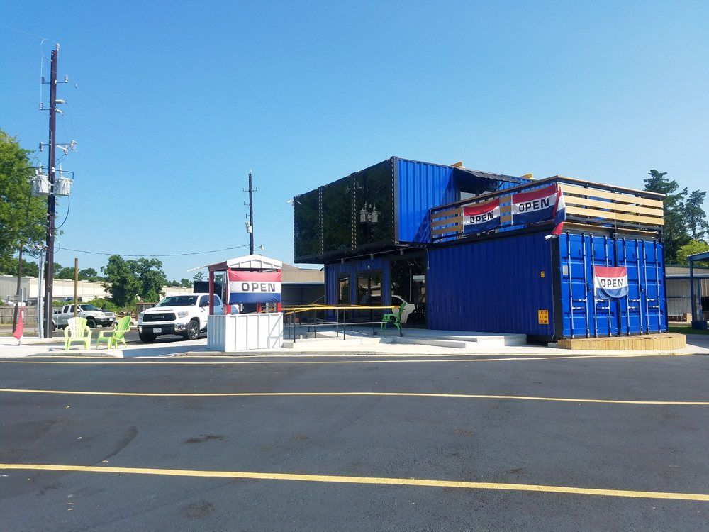 A pepsi sign is on the side of a building