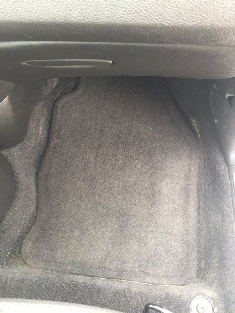A close up of the floor of a car.