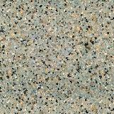 Speckled, mottled granite surface in shades of tan, gray, and black.