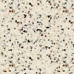White surface with small flecks of black, gray, and red-brown scattered throughout.