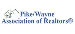 Pike/Wayne Association of Realtors logo with blue text and a small green house icon