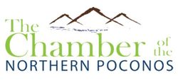 The Chamber of the Northern Poconos logo with green and blue text and brown mountain peaks above