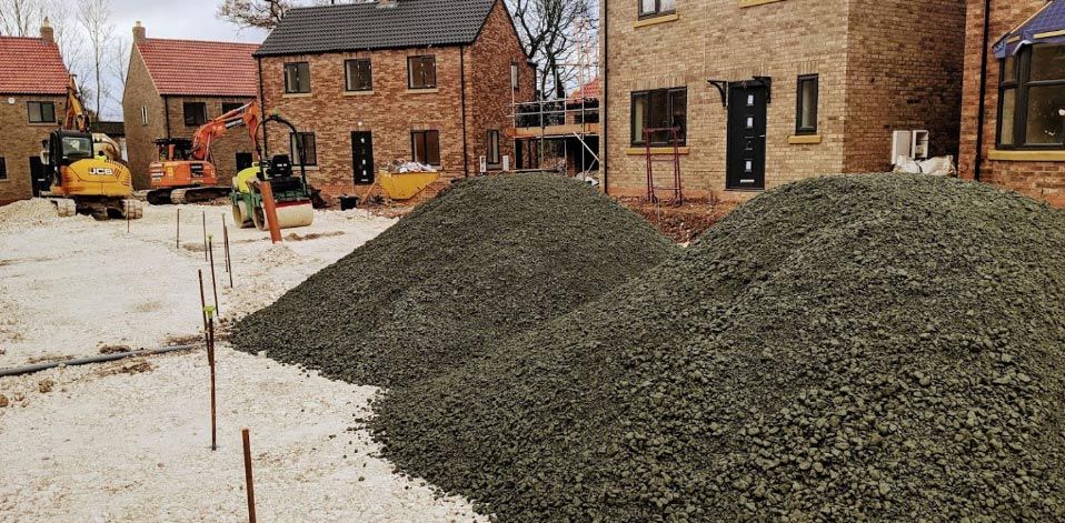 Two large piles of gravel