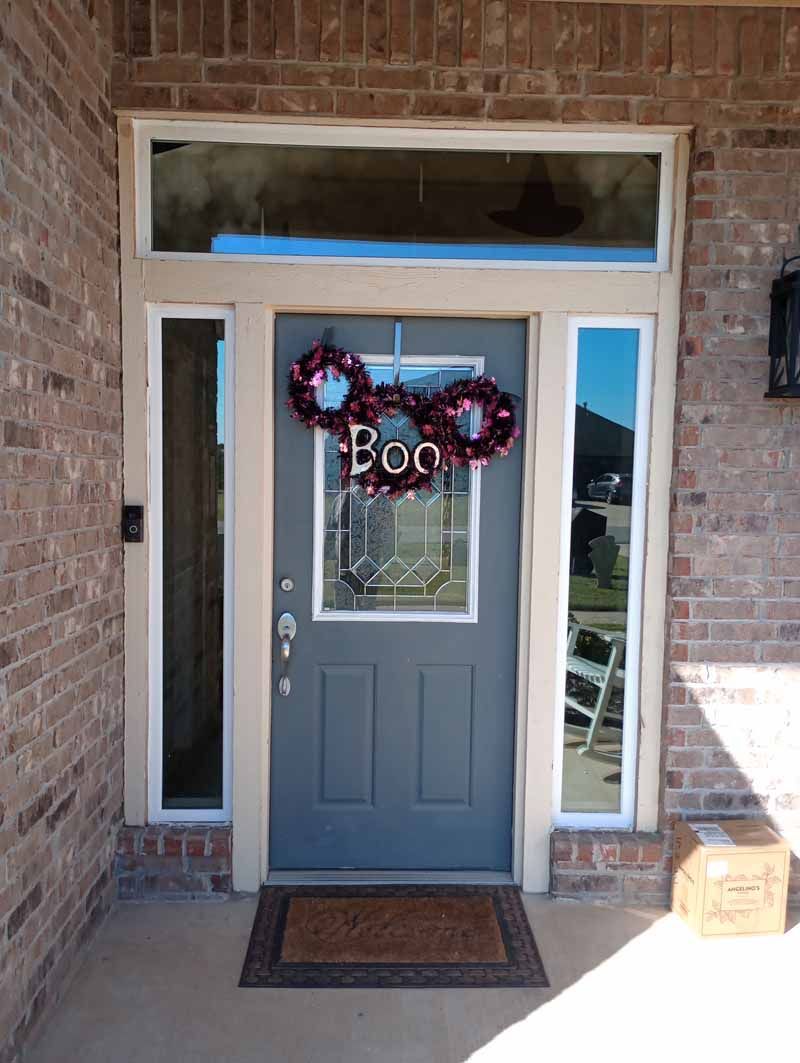 A gray front door with two 