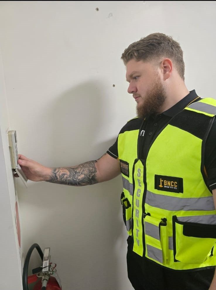 A White Security System is Mounted on a Wall — BNCC Security Services in Port Macquarie, NSW