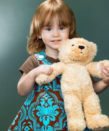 Girl with Teddy Bear — Charity Foundations in Palm City, FL