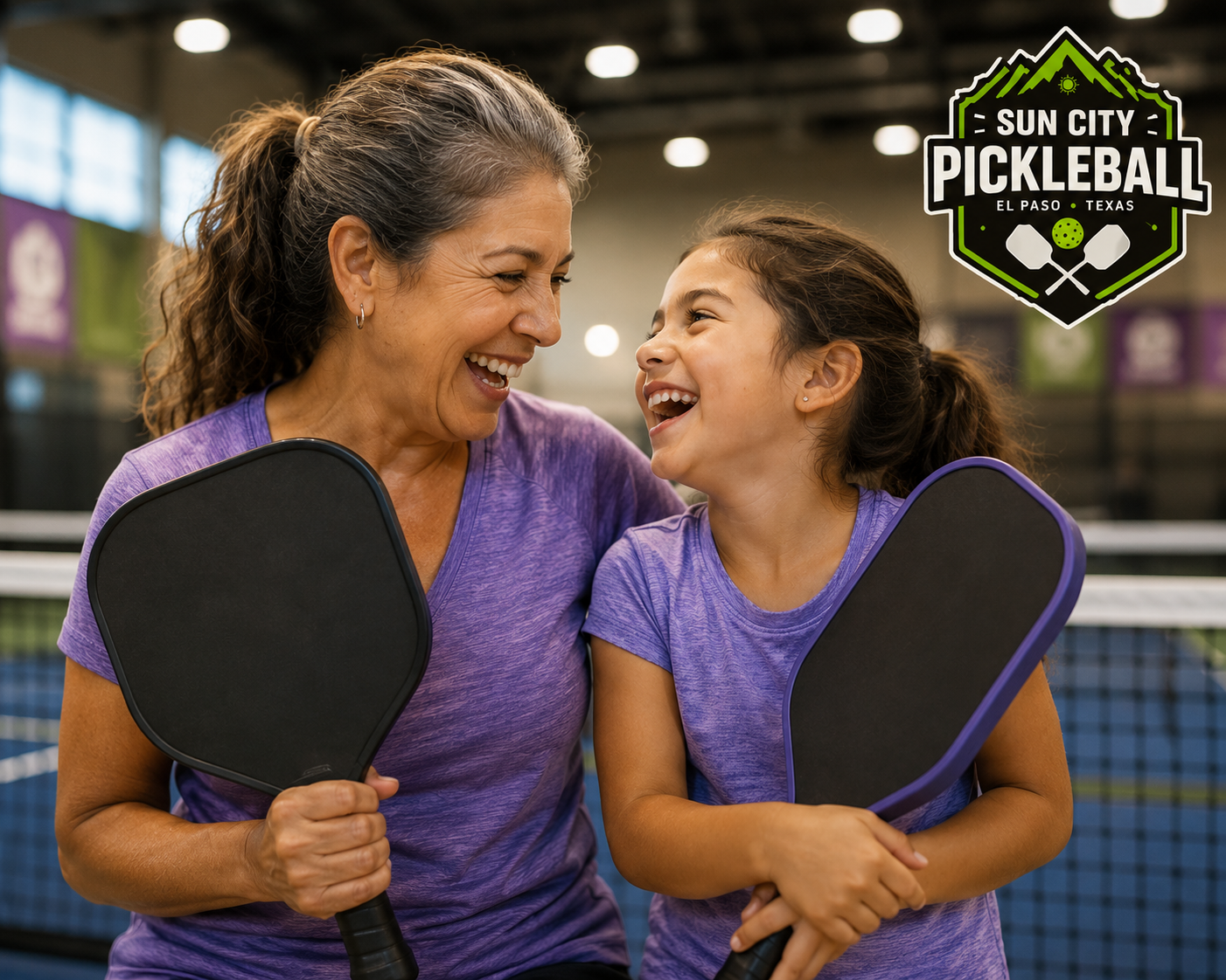 Family pickleball El Paso players sharing a doubles game at Sun City Pickleball Club.