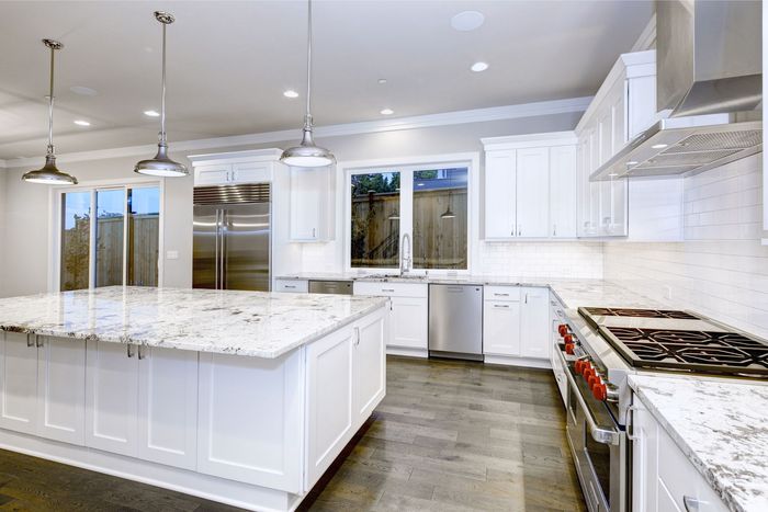 White Themed Kitchen With Custom Countertops