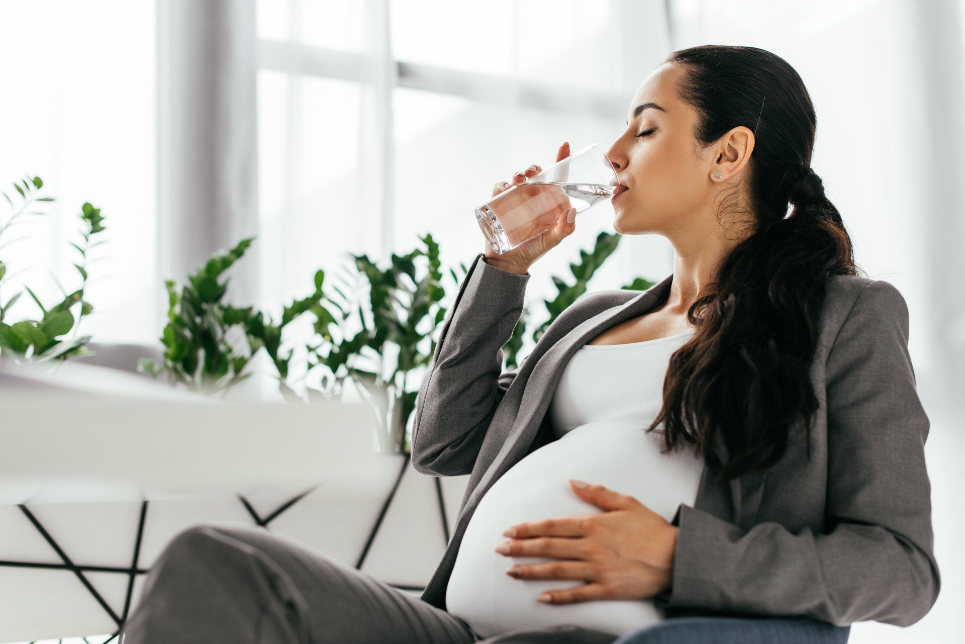 pregnant mom drinking water