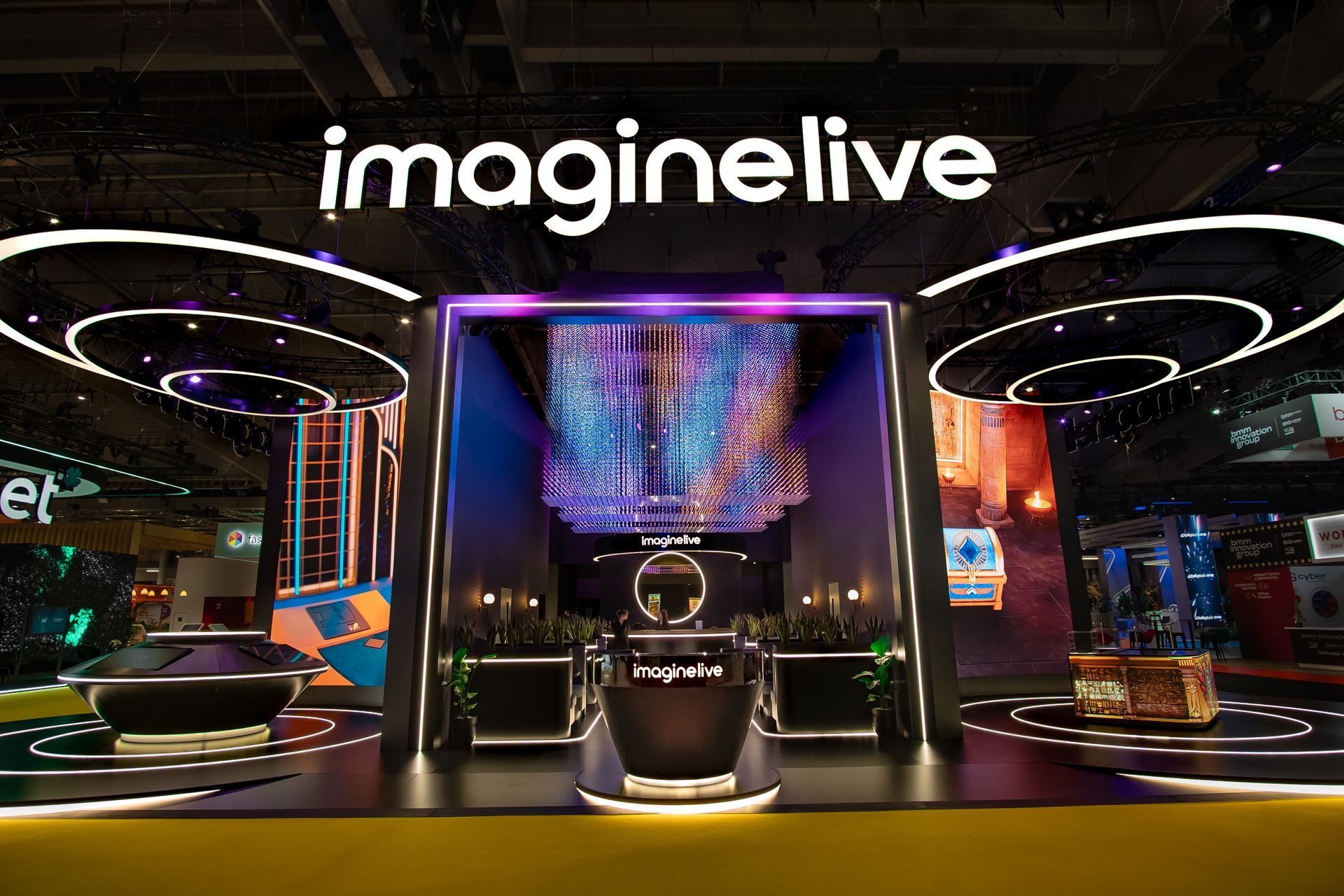 A photograph of the front view of the Imagine Live stand at ICE 2026 in Barcelona