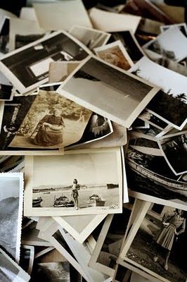 An image of old vintage family photos. One of a lady from the Victorian era sat in her garden and in another photo a lady is on holiday and stood at a harbour in front of some rowing boats.