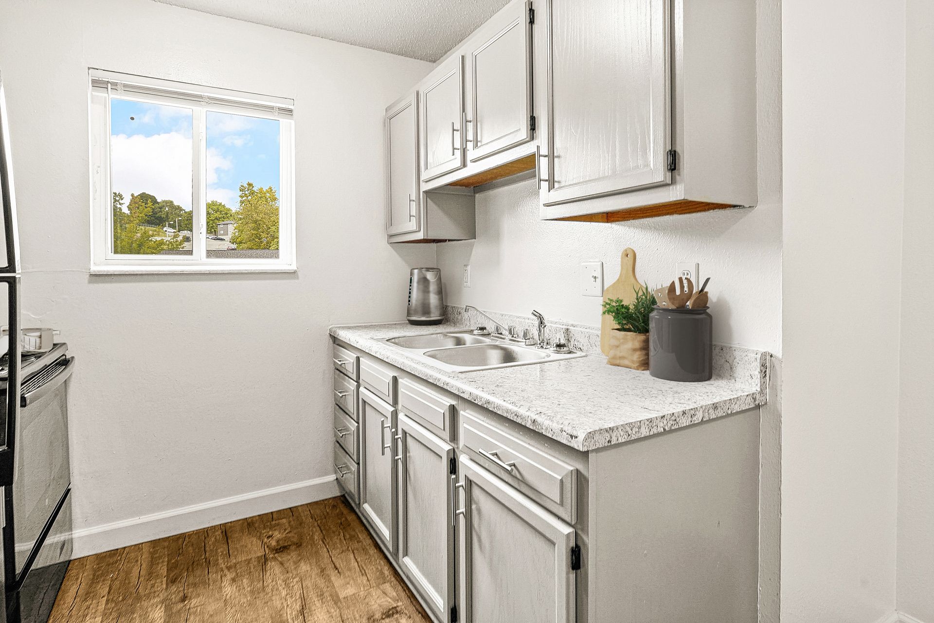 Updated kitchen with grey cabinets