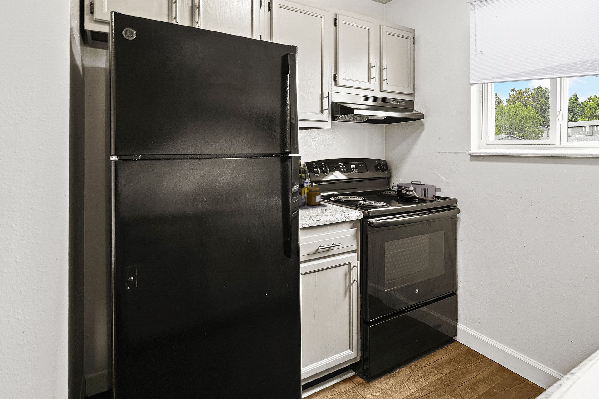 Updated kitchen with grey cabinets