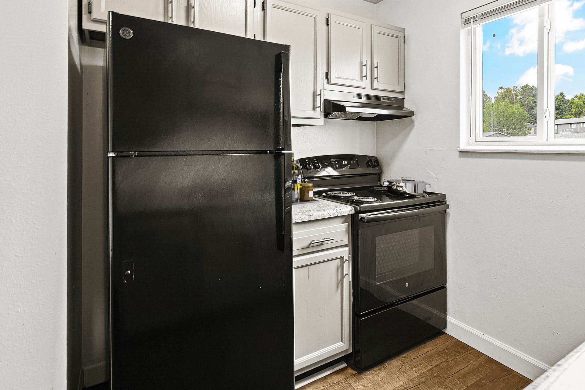 Updated kitchen with grey cabinets