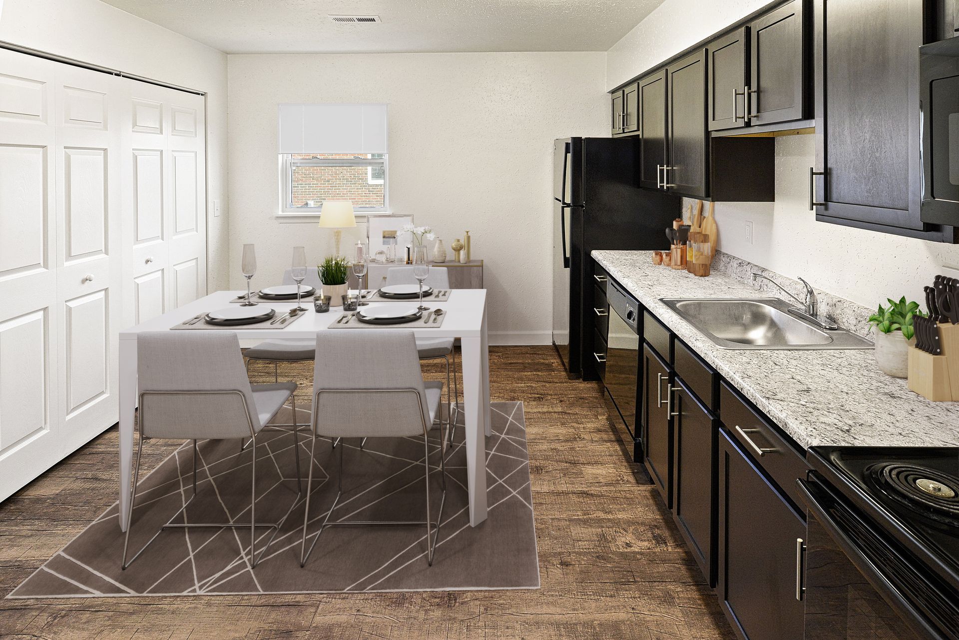 Updated kitchen with espresso cabinets and dining area