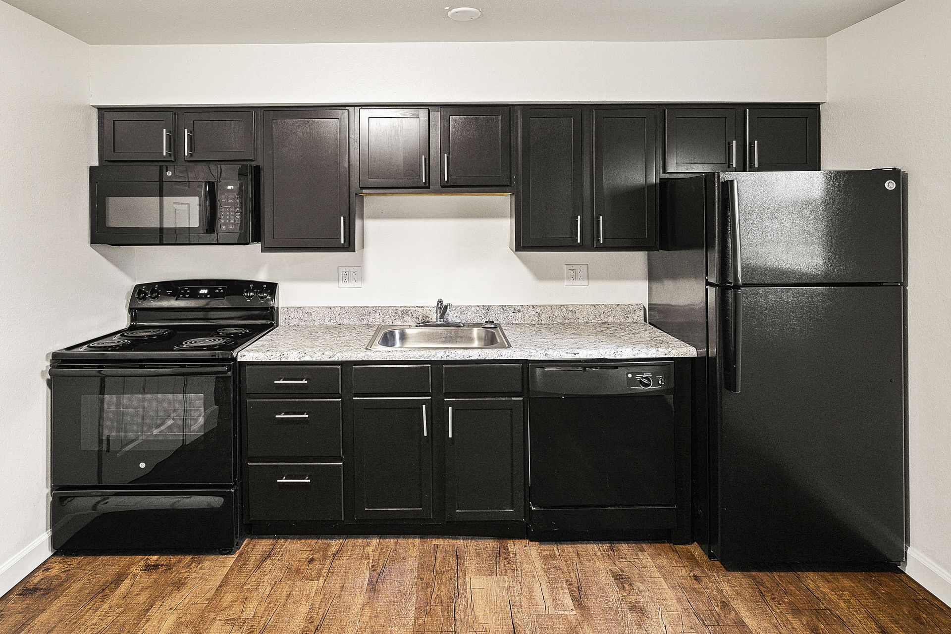 Updated kitchen with espresso cabinets